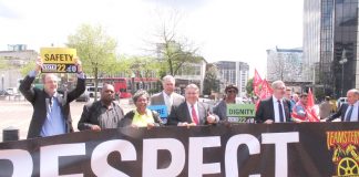 Teamsters leader JAMES HOFFA (centre) standing with Unite leader LEN McCluskEy, emphasised  that US and UK workers are struggling against the same bosses