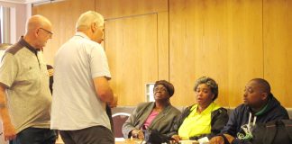 Unite members discuss with Teamsters union members at National Expresss subsidiary, Durham School Services, EVELINA MOULTRIE (South Carolina) PATRICIA CHILLIS (Illinois), and LESTER HAWTHORNE (Florida)