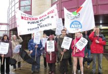 ‘KEEP THE NHS FREE’ demonstrators greet delegates to the GP conference in York – delegates voted for that policy