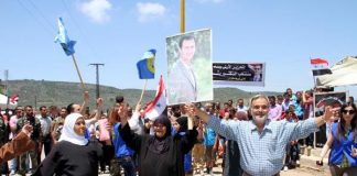 Syrians enthusiastically show their support for President Assad in Lattakia in the run-up to the election on June 4th