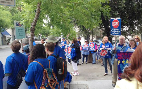 Postal workers picket of Staples to boycott the stores’ use of non-union workers providing postal services