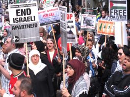 End Israeli Apartheid. Boycott Apartheid Israel were popular slogans