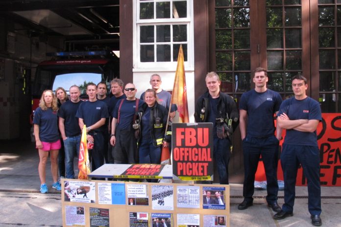 Firefighters on the picket at Euston in north London at the begining of their 24 hour strike at 9am yesterday morning