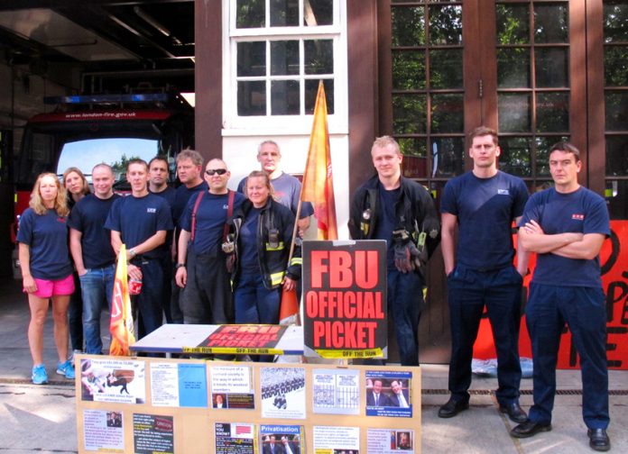 Firefighters on the picket line at Euston fire Station during the their last strike on June 7
