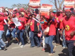 NUMSA begins indefinite strike action! NUMSA auto workers marching during their strike last September