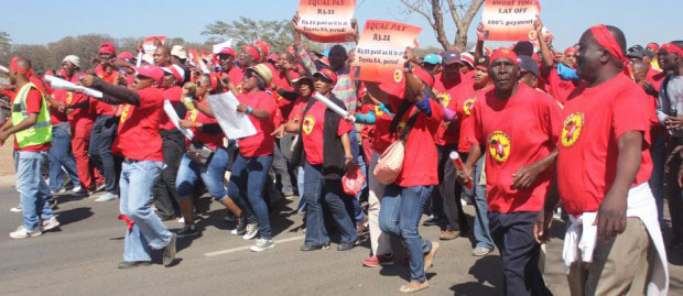 NUMSA auto workers marching during their strike last September