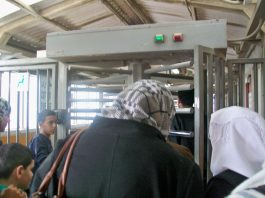 Brutally beaten Palestinian-American teen under house arrest! Palestinian family face daily harassment at an Israeli army checkpoint