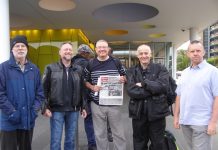 Striking London Underground power workers on their picket line opposite Southwark tube station early yesterday morning