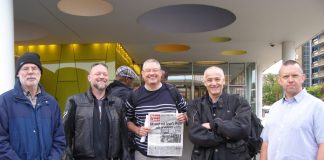 Striking London Underground power workers on their picket line opposite Southwark tube station early yesterday morning