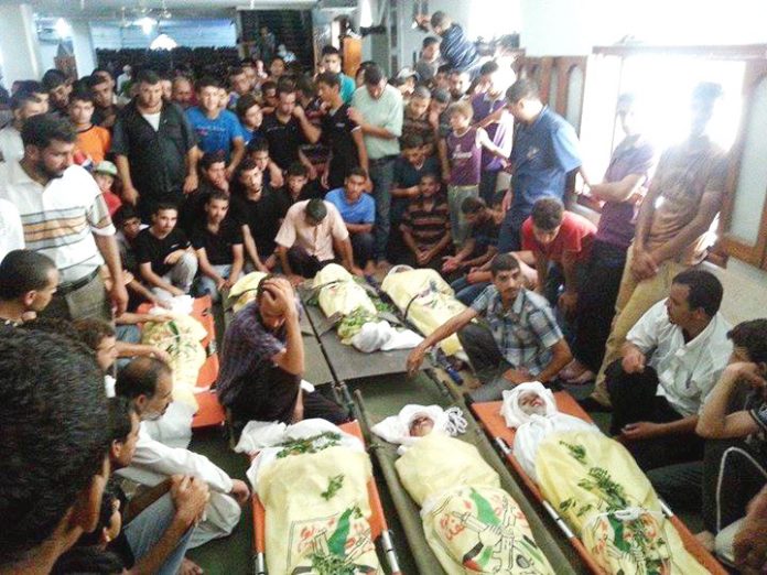 Palestinians in Gaza mourn the victims of the savage Israeli air attacks