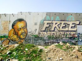 Mural depicting Marwan al-Barghouthi painted on the separation wall at the Qalandia checkpoint in Ramallah
