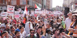 A section of the huge angry crowd rallying in Kensington High Street outside the Israeli embassy last Saturday