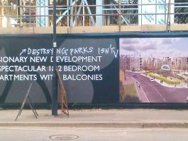 Graffiti on the billboard of the Myatts Field North ‘regeneration’ site. Residents are protesting at their building site conditions