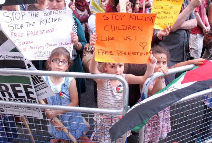 There have been massive demonstrations in Britain in support of the people of Gaza. The picture shows children taking part in  Tuesday’s demonstration outside the Israeli embassy. They were very aware that children just like them are being murdered in Gaz