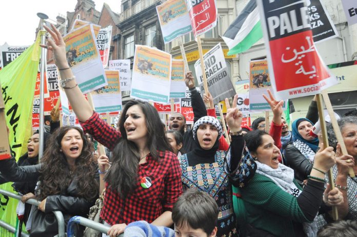 A section of the passionate crowd demanding an end to the Israeli terror state at a recent protest outside its embassy in west London
