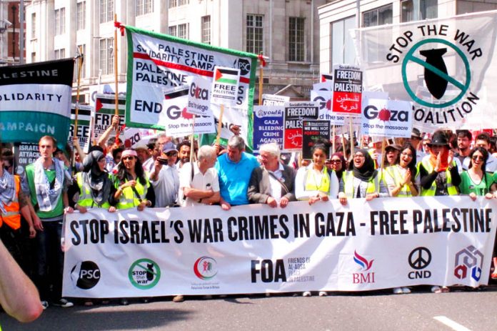 The front of Saturday’s 120,000-strong march sets off from outside the Israeli embassy in London