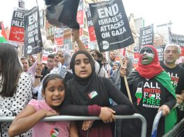 Palestinian children on last Friday’s demonstration outside the Israeli embassy in London