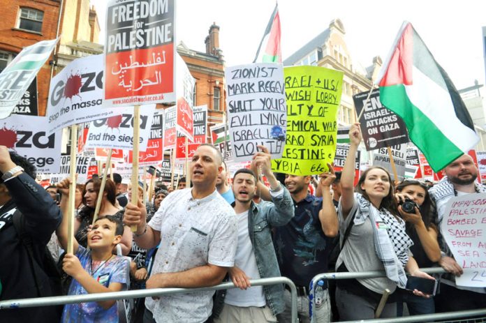 Demonstrators in London demand an end to the Israeli onslaught on Gaza