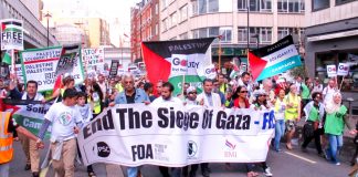 Marchers in central London last Saturday demanding ‘End the siege of Gaza’ cheered the resignation of Foreign Office Minister Warsi