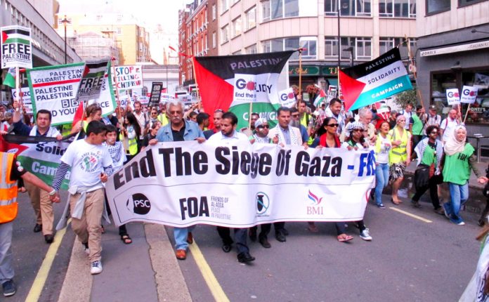 Marchers in central London last Saturday demanding ‘End the siege of Gaza’ cheered the resignation of Foreign Office Minister Warsi