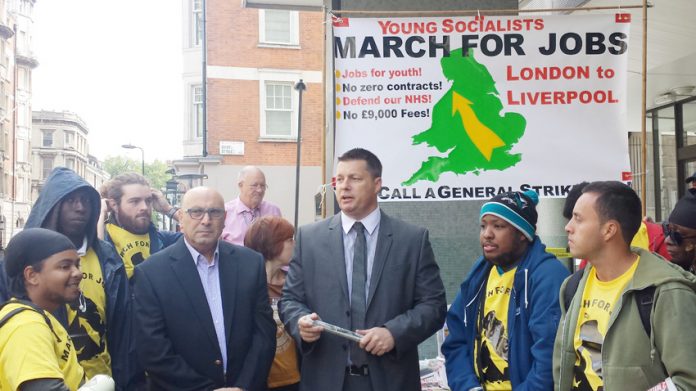 MANUEL HASSASSIAN, Palestinian Ambassador to London and JOE SIMPSON the POA Assistant General Secretary address the marchers and wish them the best before they set off on the road to Liverpool