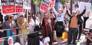 Women at the front of Saturday’s demonstration depicting the Israeli slaughter of Palestinian children in Gaza