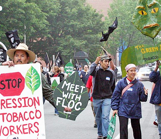 Tobacco workers marching to demand the employers meet with the Farm Laborers Organizing Committee