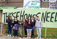 E15 Focus Mothers Group and their supporters outside the four empty flats on the Carpenter’s Estate which are now occupied