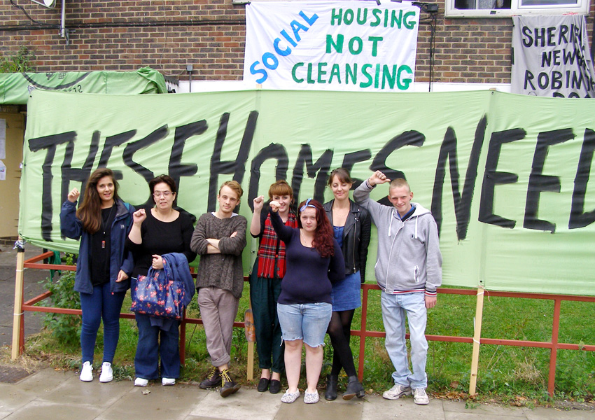 E15 Focus Mothers Group and their supporters outside the four empty flats on the Carpenter’s Estate which are now occupied