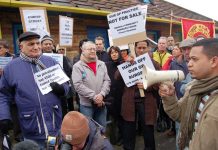 GPs and patients demonstrate against the threat of closure of 22 GP surgeries in East London alone