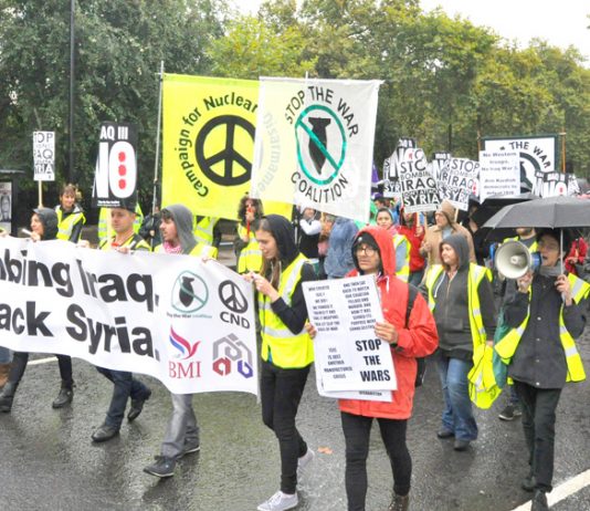 As military chiefs called for ‘boots on the ground’ in Syria and Iraq thousands marched in the rain in London on Saturday against the war