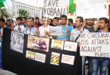 Marchers in Athens city centre on Wednesday night demanding the Turkish government support the Kurds fighting ISIS in Kobane