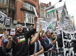 Reconstruction of Gaza will cost $4bn Demonstration outside the Israeli embassy in London demanding an end the the Israeli assault on Gaza