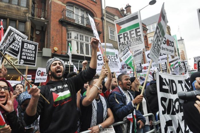 Demonstration outside the Israeli embassy in London demanding an end the the Israeli assault on Gaza