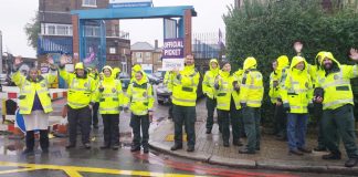 Solid picket line of ambulance workers at the Deptford Ambulance Station