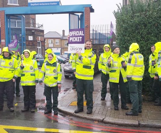 Solid picket line of ambulance workers at the Deptford Ambulance Station