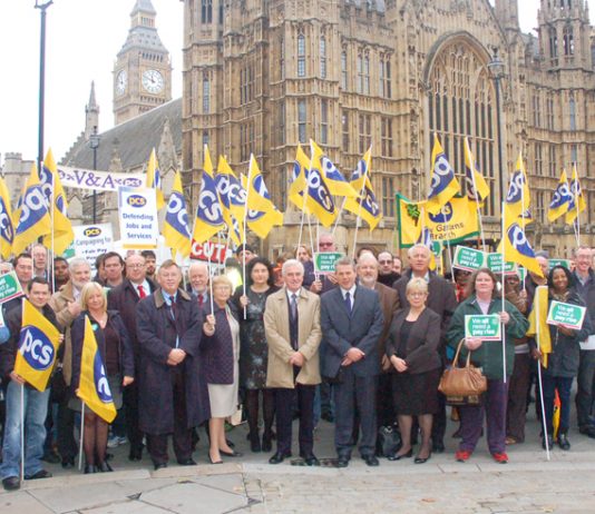 PCS strikers with their General Secretary MARK SERWOTKA outside Parliament yesterday lunchtime