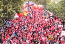 Unite banners assemble on London’s Embankment at the front of Saturday’s 150,000-strong march