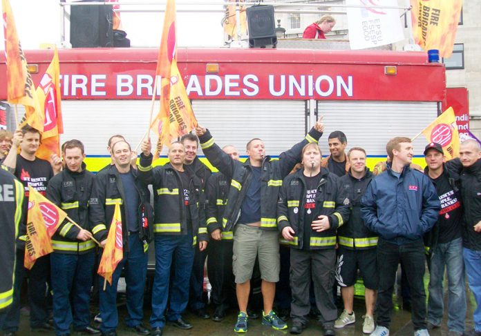 Firefighters demonstrate in central London in July against the attack on pensions