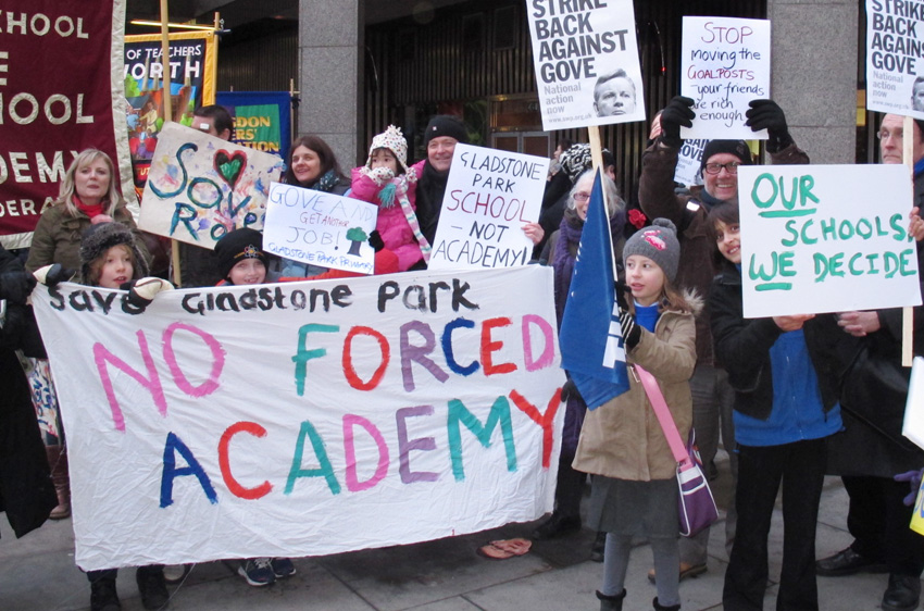 Teachers, parents and pupils demonstrate against academy schools