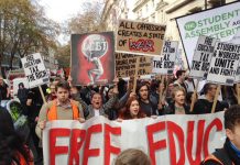 Students marched from the University of London Union to Parliament yesterday demanding free state education. In Parliament Square they tore down the fences and occupied