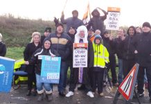 Workers at Queen Elizabeth Hospital, Woolwich, on the first day of their two-day strike in a bitter struggle against the privateer ISS