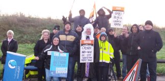 Workers at Queen Elizabeth Hospital, Woolwich, on the first day of their two-day strike in a bitter struggle against the privateer ISS