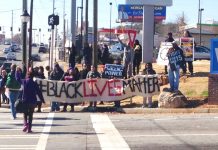 Walmart workers and Ferguson protesters picket a Walmart store in Atlanta