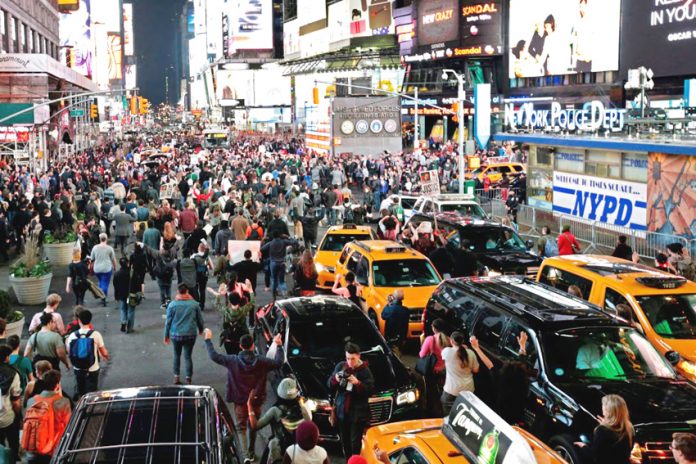 ‘Hands Up Don’t Shoot’ protest in New York’s Times Square in solidarity with Ferguson, Missouri where Michael Brown was shot