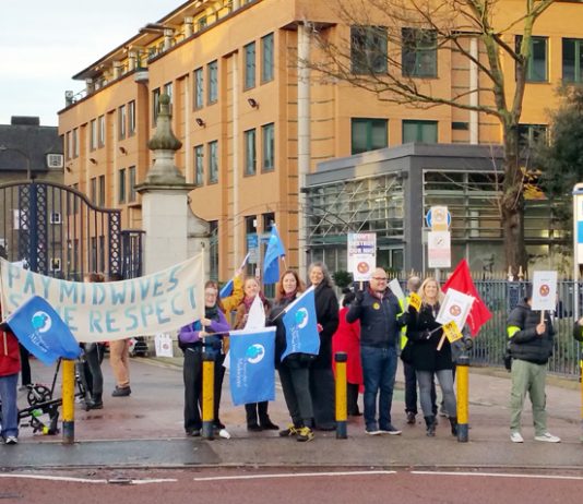 Midwives and nurses taking strike action last month – they are not prepared to put up with permanent wage-cutting and pension busting