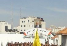 Crowds gather in Ramallah for the funeral of murdered Palestinian Minister Ziad Abu Ein