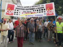 CGT members marching against pay and pension cuts for gas and electricity workers