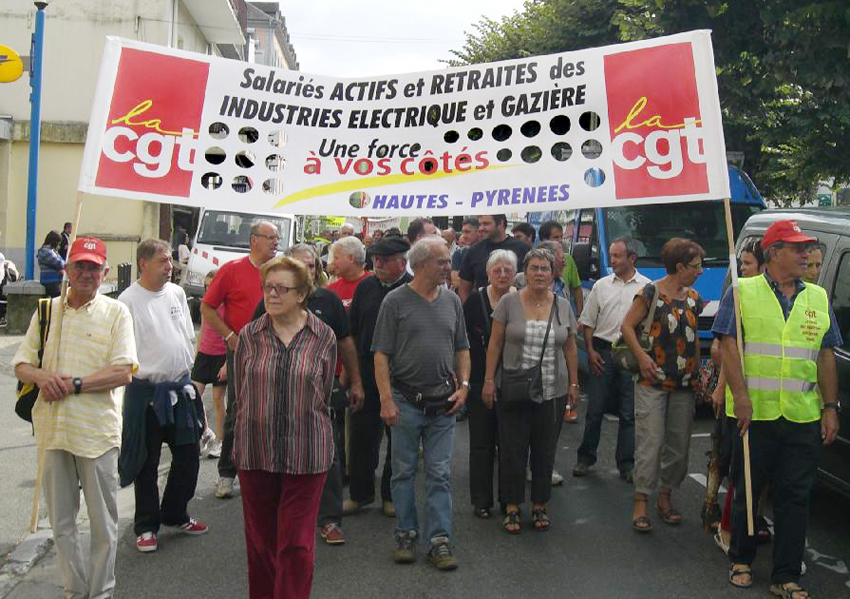 CGT members marching against pay and pension cuts for gas and electricity workers