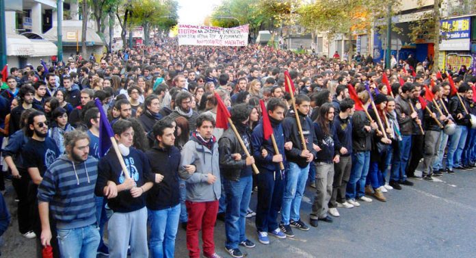 School students marching in Athens on the 6th anniversary of the police shooting of 15-year-old Alexis Grigoropoulis on 6th December 2008